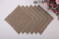 Brown linen maple leaf embroidered cocktail napkin.