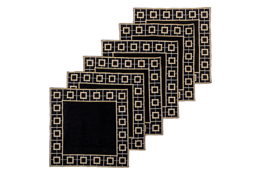 Black linen embroidered cocktail napkin.