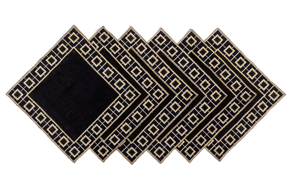 Black linen embroidered cocktail napkin.