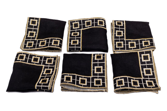 Black linen embroidered cocktail napkin.