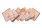Peach linen white floral printed cocktail napkin.