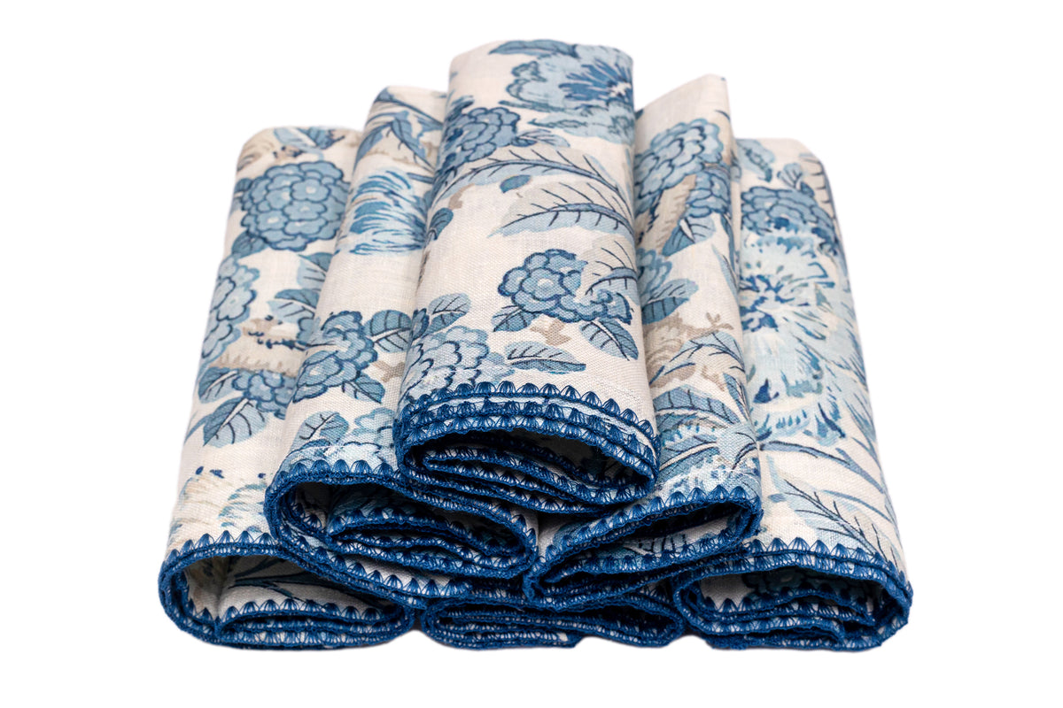 White linen blue leaves printed dinner napkin.