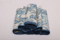 White linen blue leaves printed cocktail napkin.