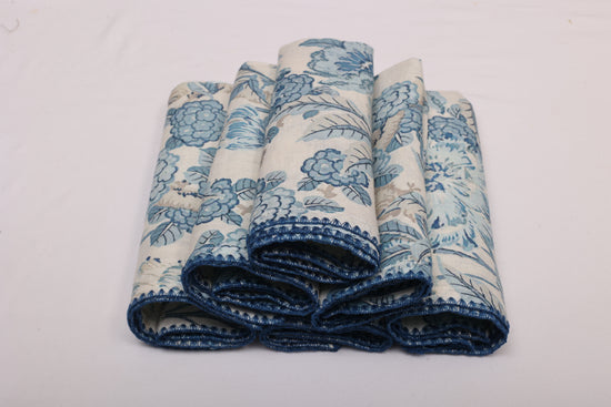 White linen blue leaves printed cocktail napkin.