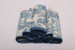 White linen blue leaves printed cocktail napkin.