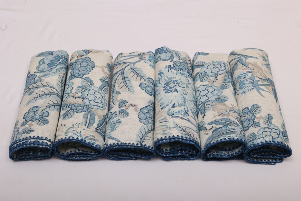 White linen blue leaves printed cocktail napkin.