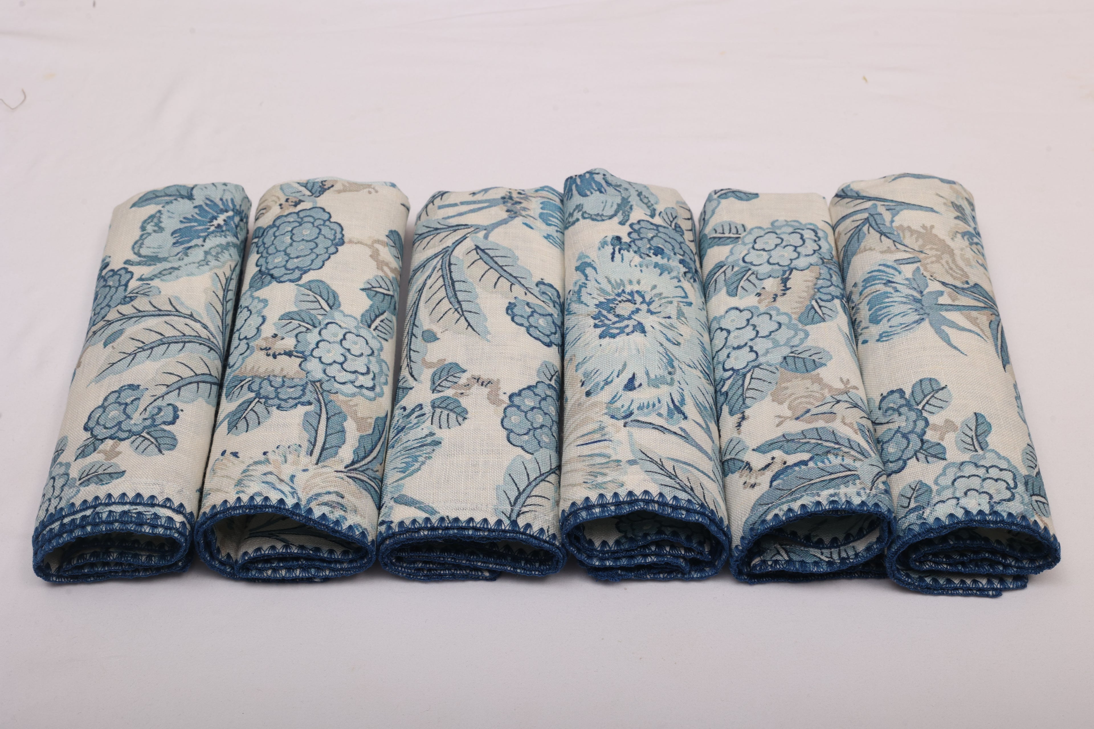 White linen blue leaves printed cocktail napkin.