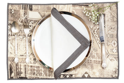 Black and white  printed linen placemats with embroidery  with cream linen napkins with black border