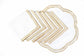 White linen gold embroidered round placemats and napkins.