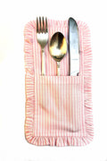Striped linen ruffles cutlery holder.