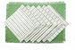 Green linen placemats with striped linen dinner napkins.