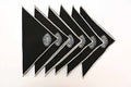 Black linen cocktail napkins with silver evil eye embroidered.