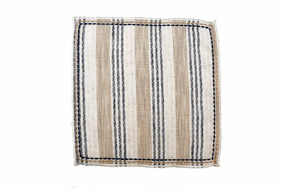 Beige striped linen cocktail napkins.