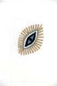 White linen placemats and napkins with Gold evil eye embroidered.