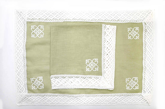 Lime green linen placemats with linen napkins with lace.