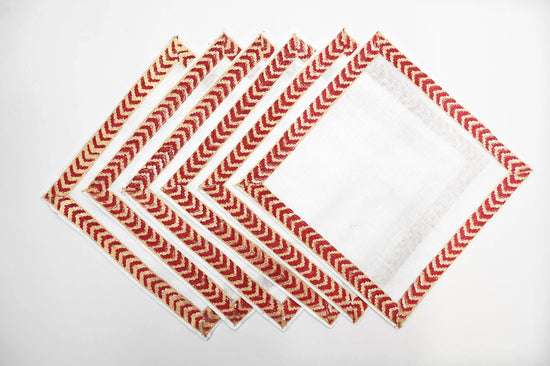 Maroon block print linen cocktail napkins.