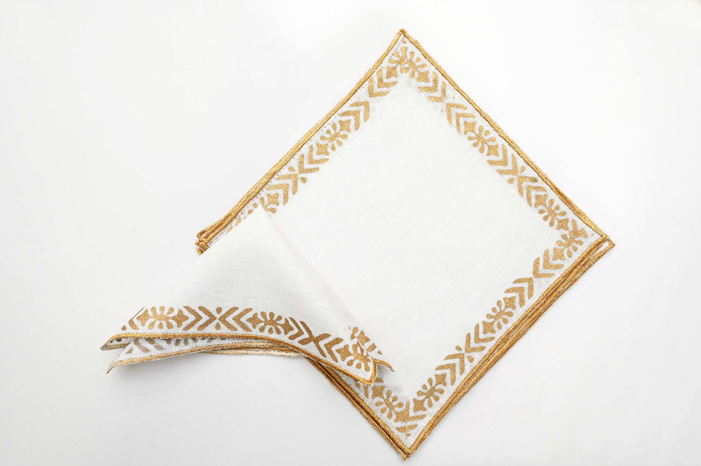 Linen cocktail napkins with line and motif.