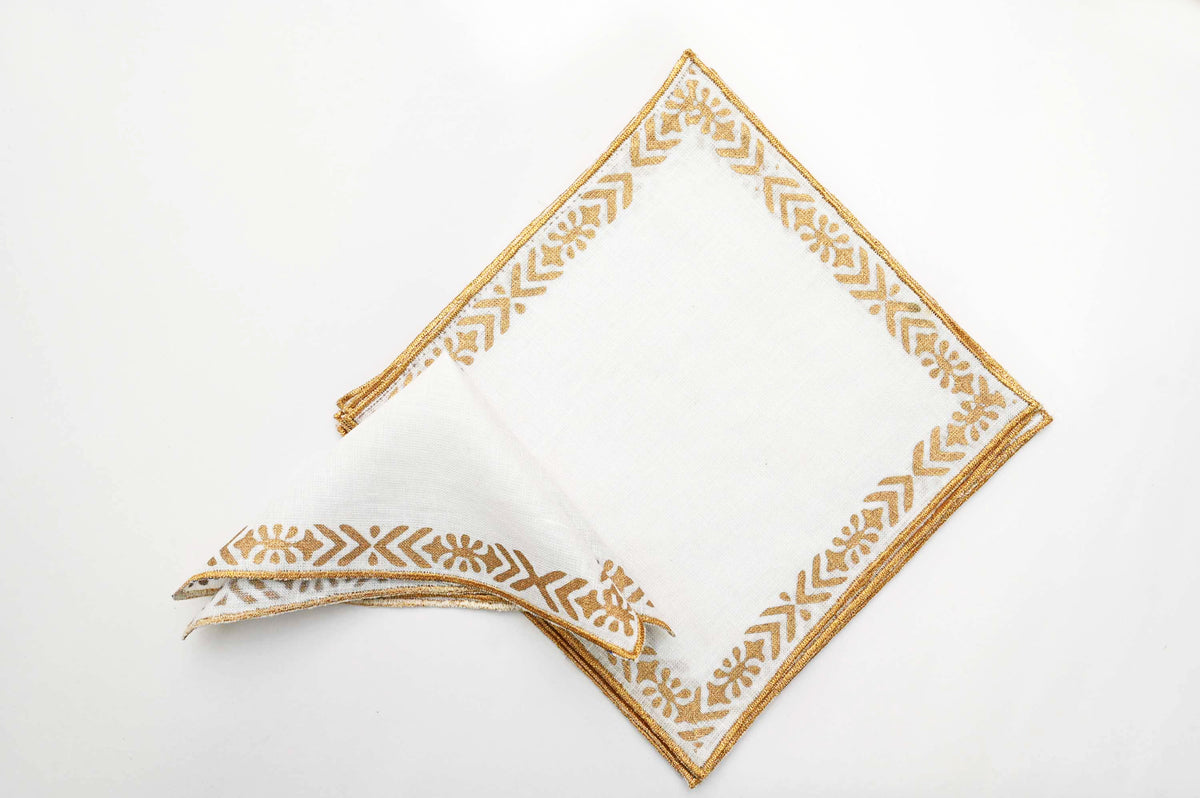 Linen cocktail napkins with line and motif.