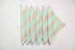 Turquoise chevron print linen cocktail napkins.