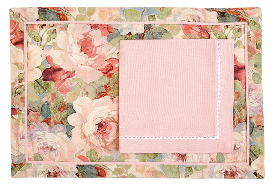 Floral linen printed placemats with pink linen napkins.