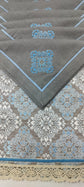 Blue printed laced placemats with blue embroidered  linen napkins