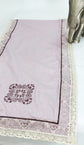 Pink linen printed embroidered runner with lace.