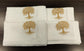White linen  dinner napkins with tree embroidery.