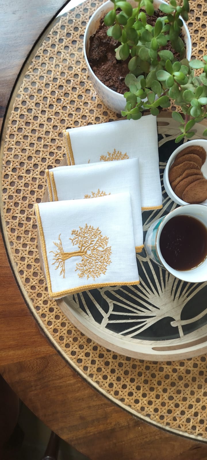 White linen cocktail napkins with tree embroidery