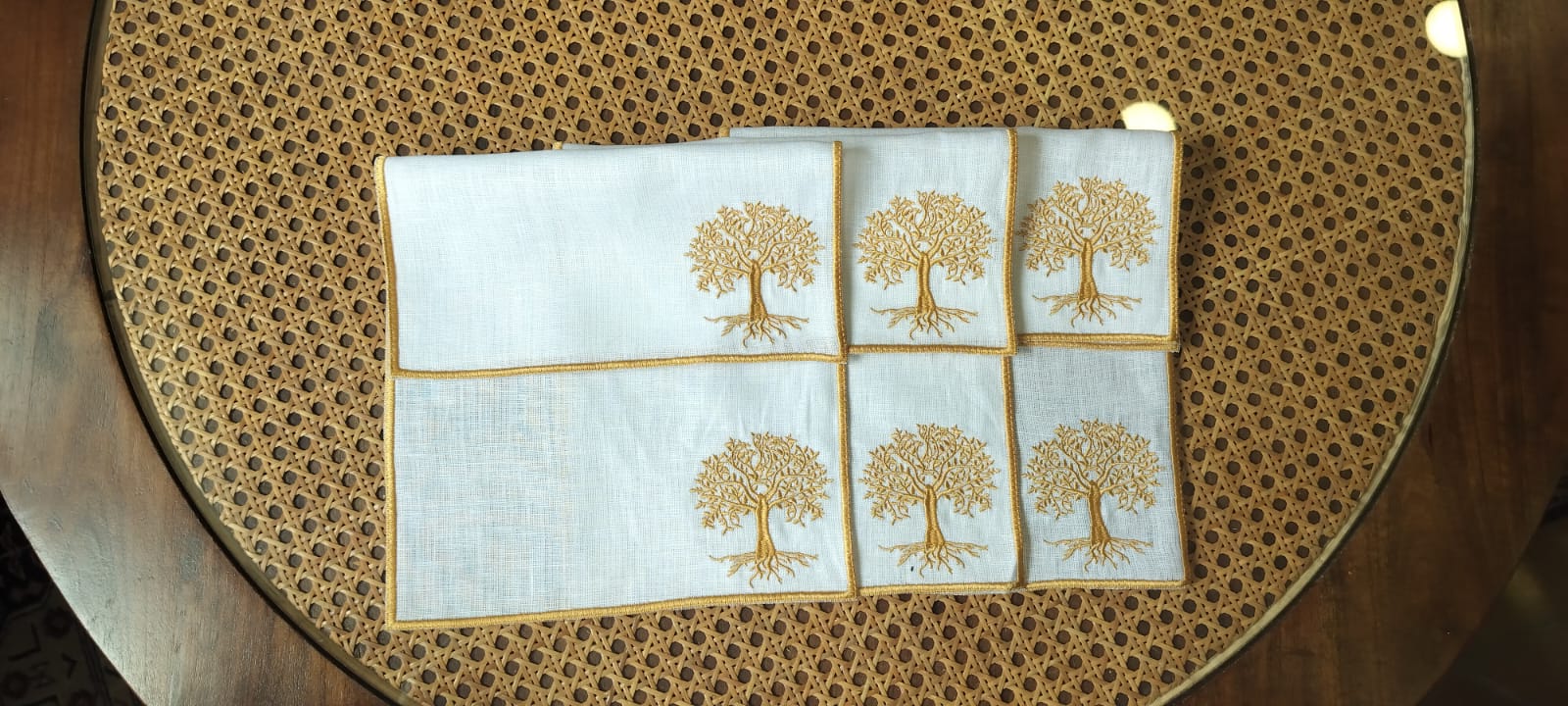 White linen cocktail napkins with tree embroidery
