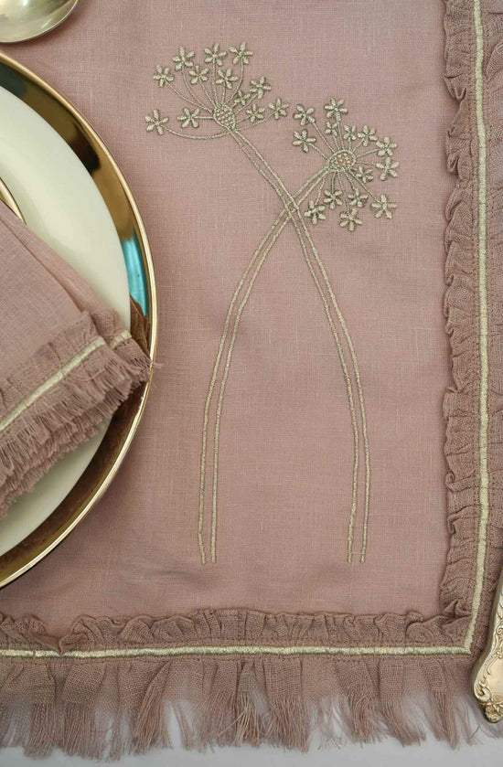 Ink pink linen placemats & napkins with silver stitch and  embroidery.