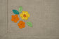 Natural Linen With Yellow And Orange Floral Placemats And Napkins