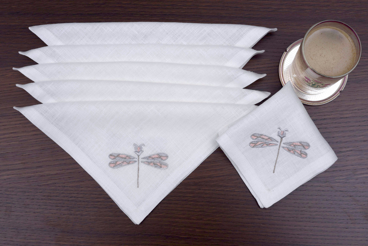 White linen cocktail napkins with dragon fly embroidery