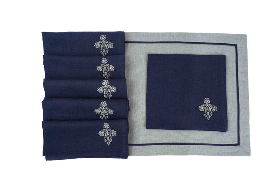Slate blue linen placemats with navy blue embroidered napkins